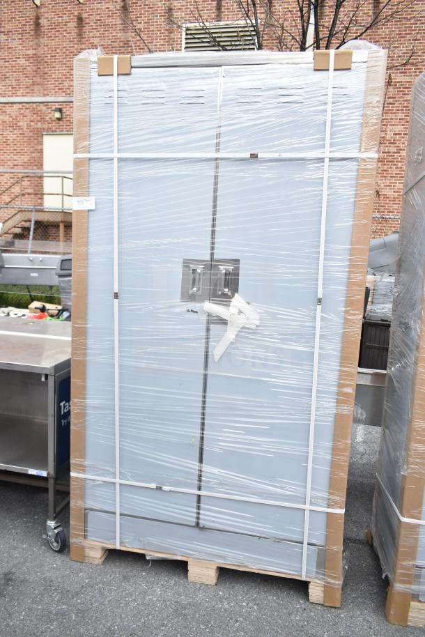 Brand new Regency 600SMC48DDM 48" stainless steel mop sink cabinet, wrapped, scratch and dent marked, on wooden pallet.