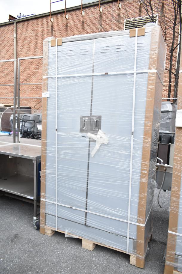 BRAND NEW SCRATCH AND DENT! Regency 600SMC48DDM 48" stainless steel mop sink cabinet, wrapped for shipping.