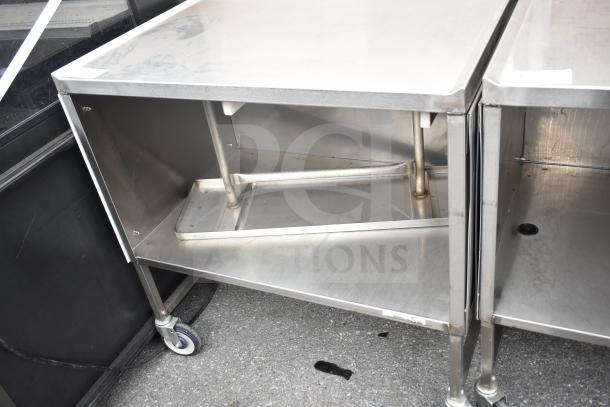 Commercial stainless steel cart with under shelf and commercial casters. Durable, ideal for heavy-duty use.