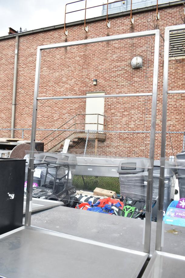 Commercial cart with under shelf, stainless steel, on heavy-duty commercial casters. Good condition, ideal for transport.