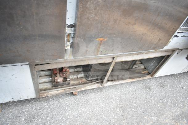 Leader FR79 S/C commercial 3-door cooler showing exterior detail with visible wear and rust. 230V, 1 Phase.