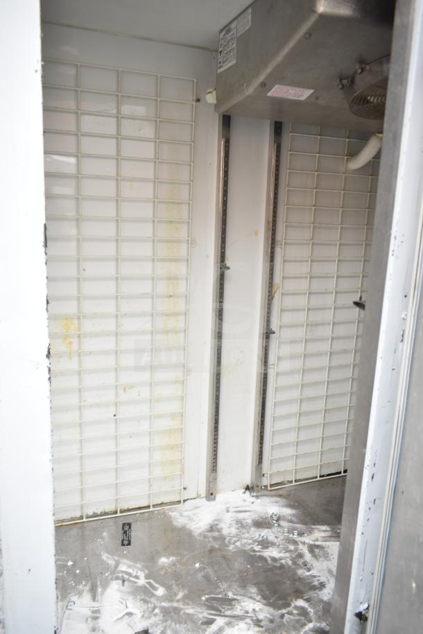 Leader FR79 S/C commercial 3-door reach-in cooler interior, showing metal shelves and fan unit. Requires 230 volts, 1 phase.
