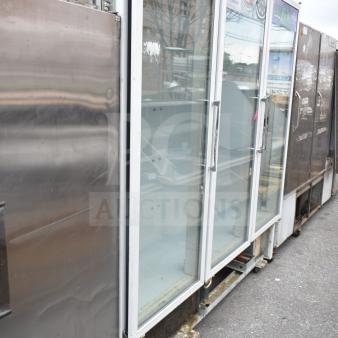 National ULG80BCP-6 commercial 3-door reach-in freezer merchandiser, glass doors, used condition, visible exterior wear.
