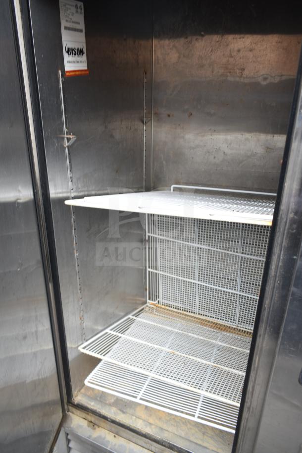 2016 Atosa MBF8508 commercial 3-door reach-in cooler, 115V, 1 phase. Interior view showing metal shelves and storage space.