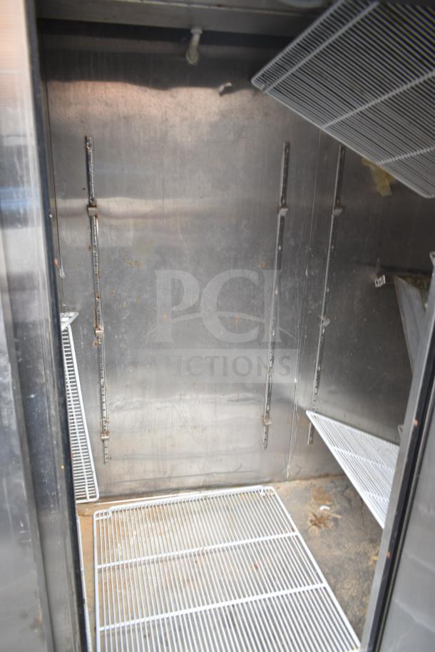 2016 Atosa MBF8508 Commercial 3 Door Reach-In Cooler interior, steel with wire shelves, used condition. 115V, 1 Phase.
