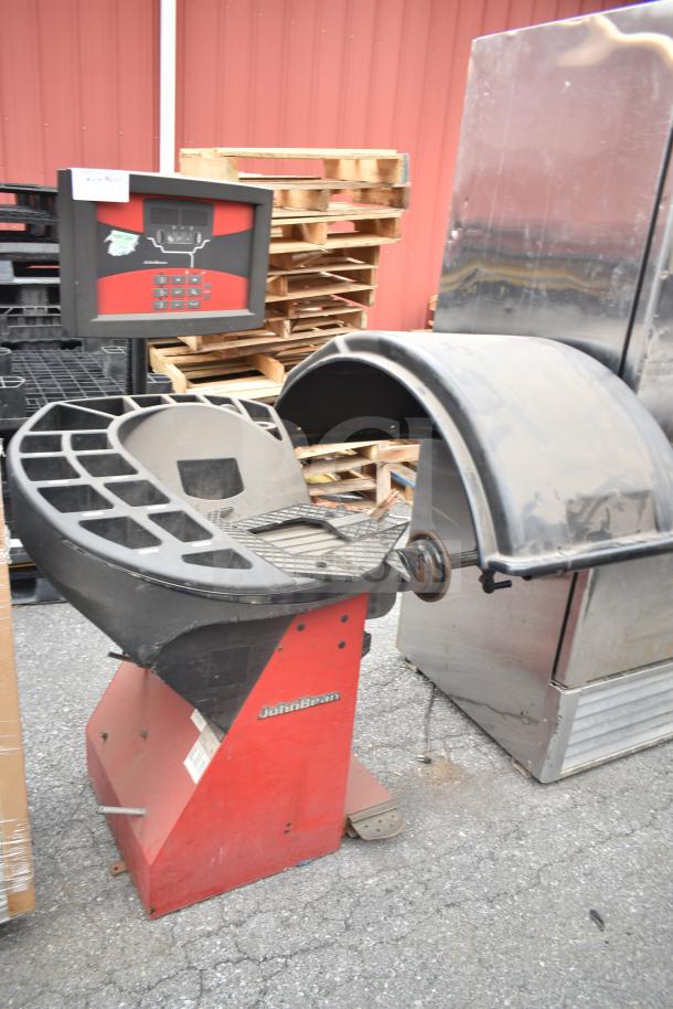 JohnBean Commercial Balancer, red and black; used condition with control panel. Visible JohnBean logo.