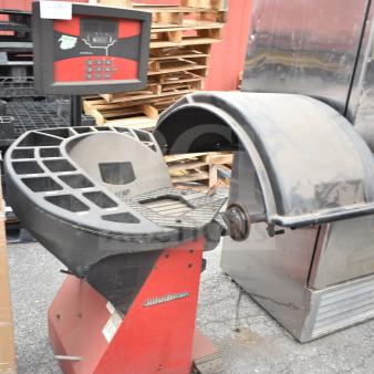 JohnBean Commercial Balancer, red and black; used condition with control panel. Visible JohnBean logo.