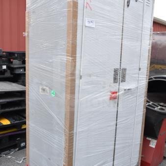 BRAND NEW Regency 600SMC48DDM 48" Stainless Steel Mop Sink Cabinet, wrapped, visible packaging with minor scratches.