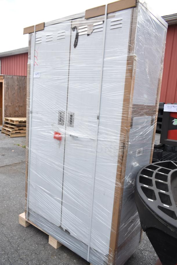 BRAND NEW SCRATCH AND DENT Regency 600SMC48DDM 48" stainless steel mop sink cabinet, wrapped, minor dents visible.