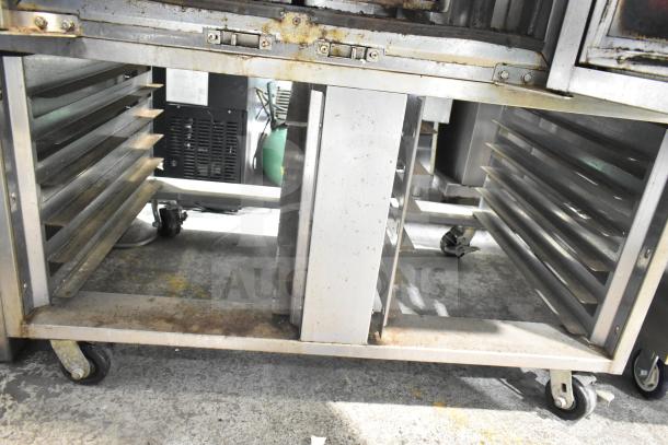 Baxter Commercial Natural Gas Mini Rotating Rack Oven, used, on double pan rack with commercial casters. Slight rust visible.