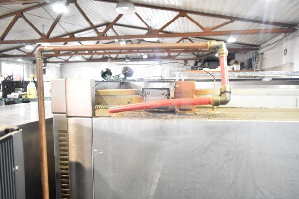 Baxter Commercial Natural Gas Mini Rotating Rack Oven on double pan rack with casters, good condition, visible gas connections.