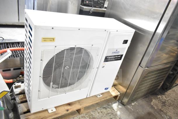 Copeland XFAM-010Z-TFC-081 condensing unit, 208-230V, 3-phase, excellent condition, visible branding and model on the unit.