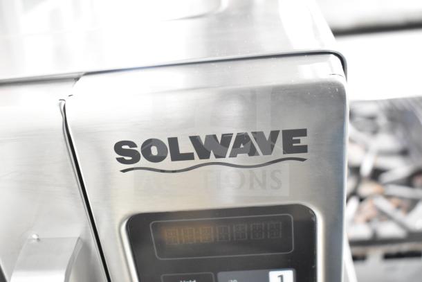 Brand new Solwave 180MW1800TH commercial microwave, stainless steel exterior, push button controls, 1.2 cu. ft. interior.