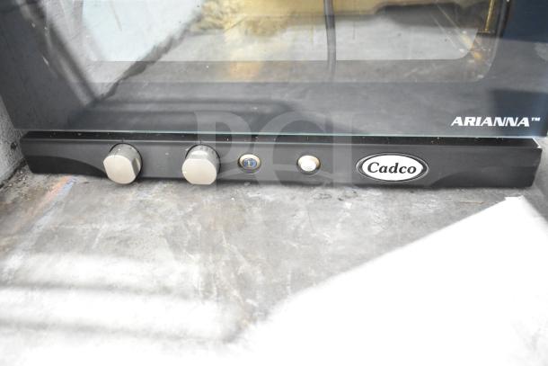 Cadco Unox XAFT133-US Arianna electric convection oven with control knobs and logo visible, 208-240V, 1 phase.