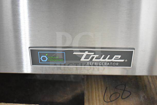True TSSU-60-16D-4-HC logo on scratch and dent commercial prep table. Features natural refrigerant.