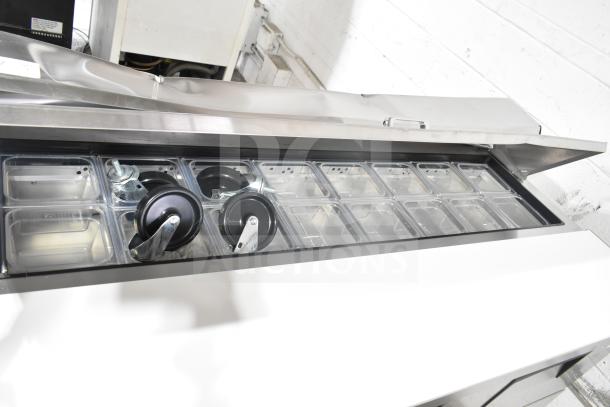 BRAND NEW True TSSU-60-16D-4-HC sandwich salad prep table with bain marie top, four drawers, and stainless steel finish.