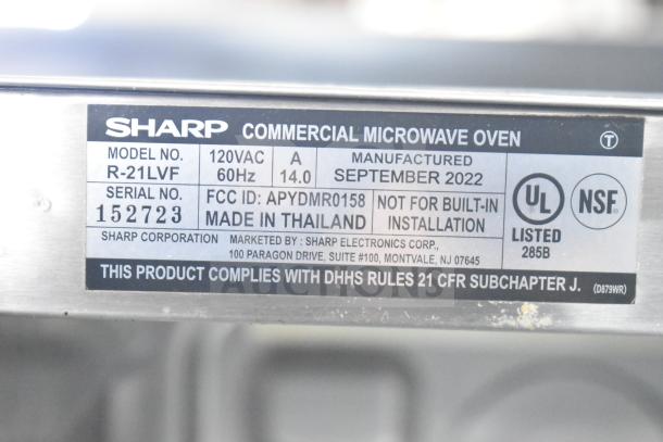 2022 Sharp R-21LVF Commercial Microwave label; 120V, 60Hz, made in Thailand, FCC ID APYDMR0158, UL and NSF listed.