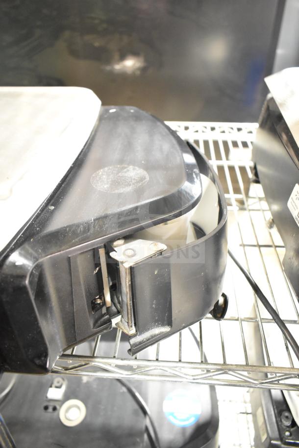 2023 Hobart HTi-7LH4W commercial food portioning scale, black, tested and working, 120/208-240 volts, 1 phase.