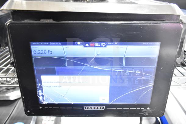 2017 Hobart HTi-7LH26 commercial scale with screen damage, no power cord. Model HTi-7LH26, 120/208-240V, tested and working.