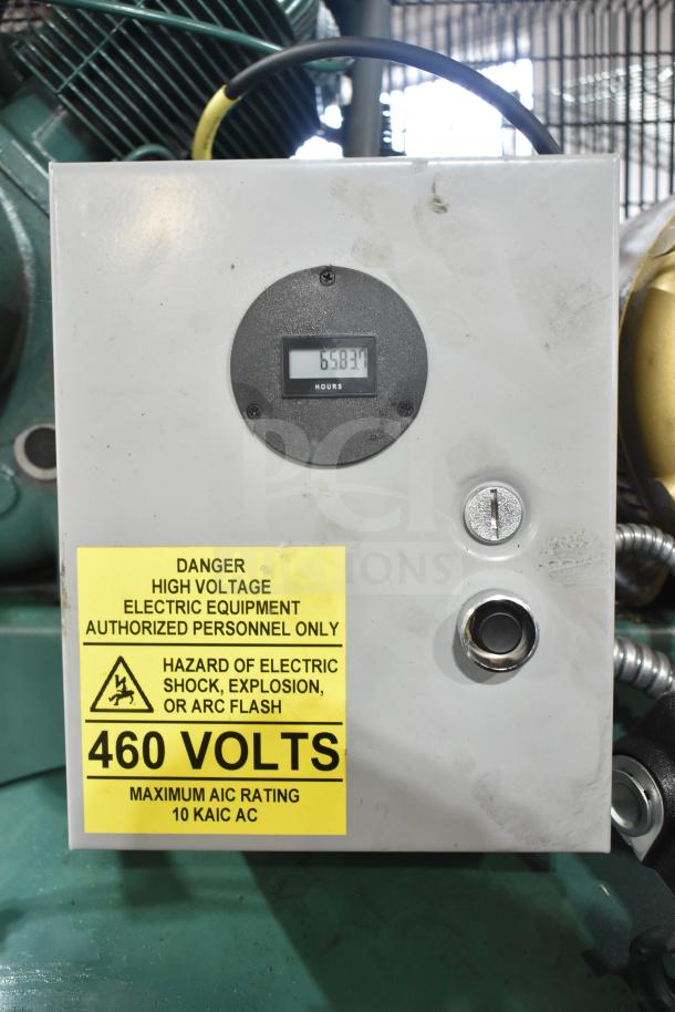 Champion 172-1 VR10-12 commercial air compressor, 460V, 3-phase. Control box showing 6583 hours. High voltage warning label.