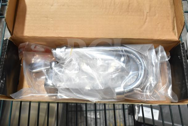 BRAND NEW Regency 600FW84G wall mount faucet with 3 1/2" swivel gooseneck spout and 8" centers, scratch and dent condition.