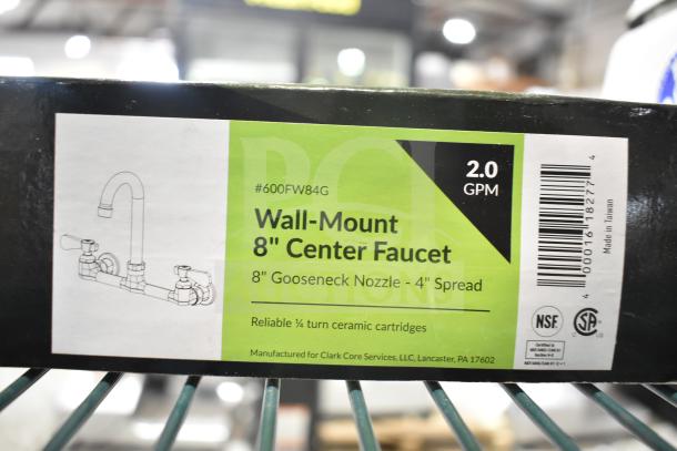 "Brand new Regency 600FW84G wall mount faucet with 3 1/2-inch swivel gooseneck spout, 8-inch centers, 2.0 GPM, in original packaging."