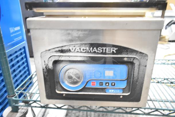 VacMaster VP210 Commercial Vacuum Sealer, used condition, stainless steel body, digital control panel, model VP210.