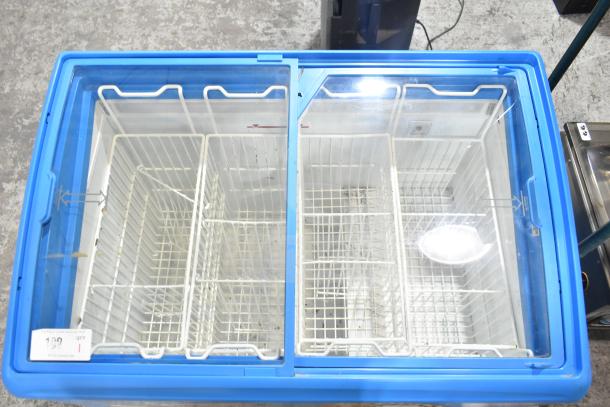 AHT RIO S 100 commercial ice cream freezer merchandiser, blue frame, glass sliding doors, 115 volts, 1 phase, excellent condition.