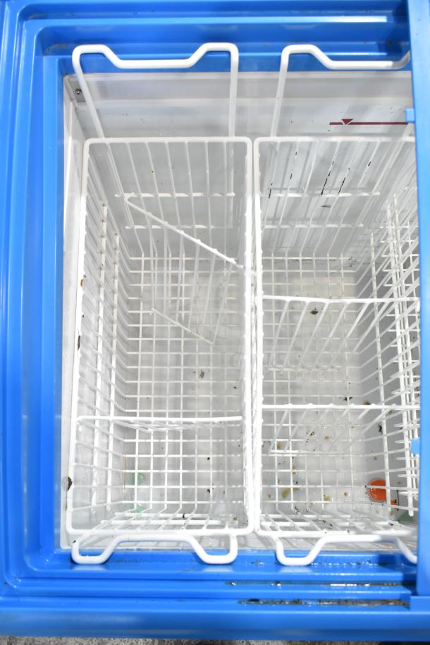 AHT RIO S 100 Commercial Ice Cream Freezer, 115 Volts, 1 Phase. Dual wire baskets, blue frame, interior view.