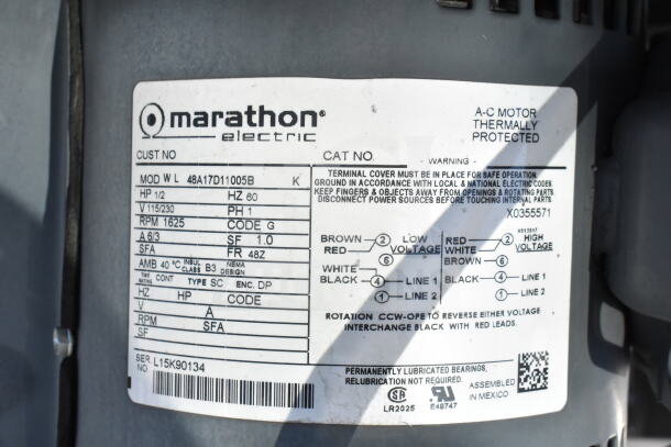 Alt text: Greenheck 6-133-A-X exhaust fan with Marathon Electric motor label, showing 115/230V, 1 phase, 1/2 HP, and wiring instructions.