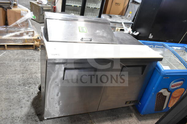 True TSSU-48-08 commercial sandwich salad prep table, stainless steel, Bain Marie top, on casters, 115V, 1 Phase.