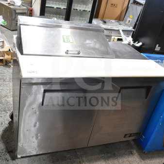 True TSSU-48-08 commercial sandwich salad prep table, stainless steel, Bain Marie top, on casters, 115V, 1 Phase.