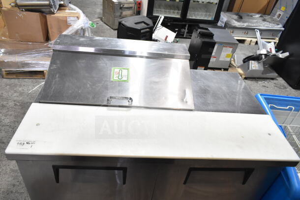 True TSSU-48-08 sandwich salad prep table, stainless steel, mega top, on casters, 115V, 1 phase, good condition.