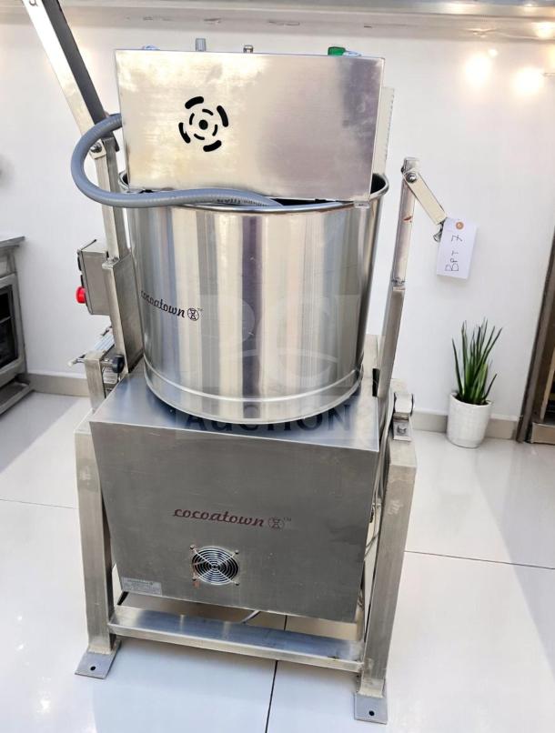 CocoaTown ECGC-65A-AV cacao grinder in excellent condition, stainless steel, 220V, fully operational, with visible branding.