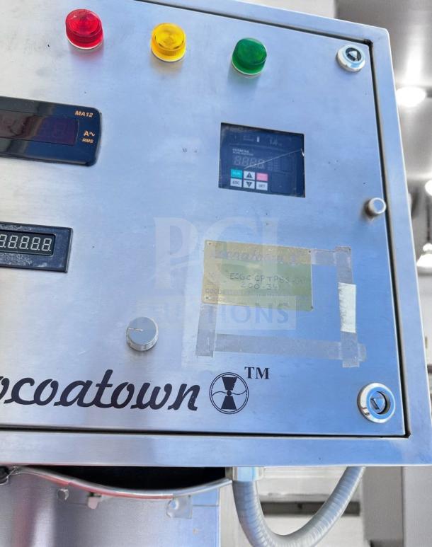 CocoaTown ECGC-65A-AV cacao grinder control panel showing operational indicators and brand logo, in excellent condition.