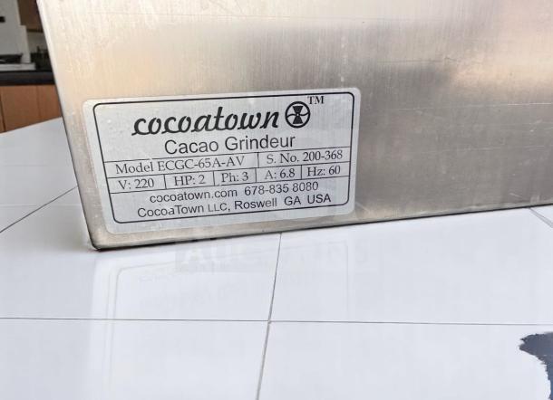 Outstanding condition CocoaTown ECGC-65A-AV cacao grinder; 220V, fully tested. Includes brand plate with model and specs.