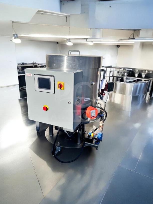 Custom Fabrication chocolate melter and mixer system, model BC8N410S, 240V, excellent condition, fully tested, stainless steel.