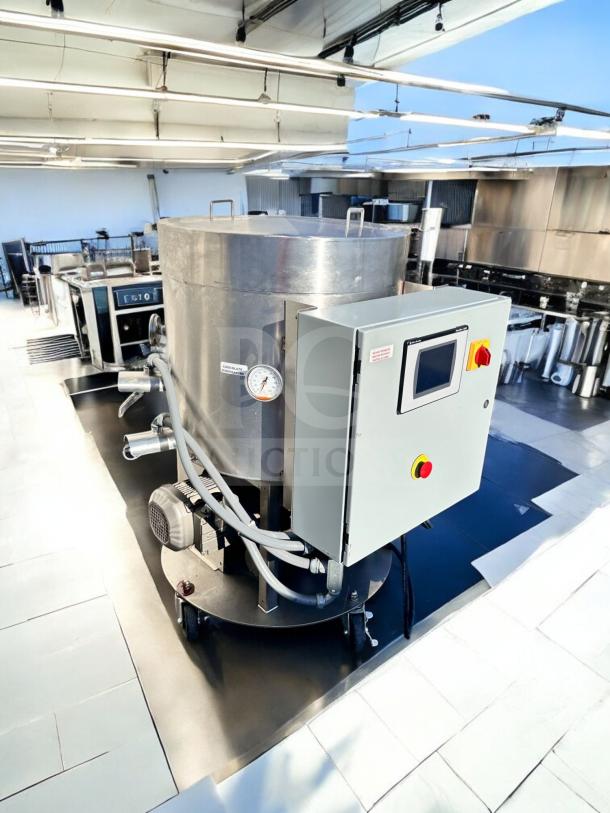 Chocolate Melter & Mixer System by Custom Fabrication, Model BC8N410S, stainless steel, 240V, excellent condition, fully tested.