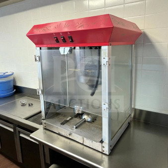 Elite Deluxe EPM-400 popcorn popper machine, 8 oz capacity, well-maintained, operational, 115V, with instruction label.