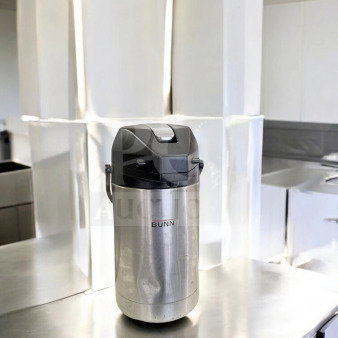 Bunn stainless steel lever-action airpot, 2.5L, excellent condition, fully tested and working, on stainless steel surface.