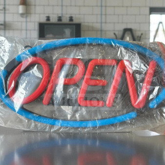 Brand new Utilitech 11.61-in multi-function LED "Open" sign, red and blue colors, sealed in plastic.