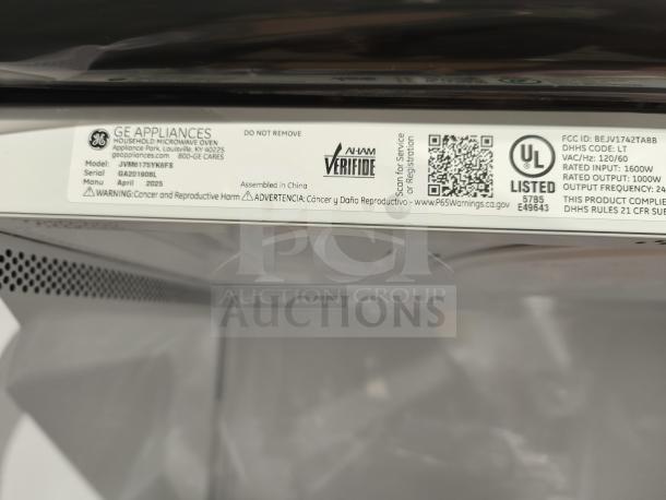 Brand new GE 1.7 cu ft over-the-range sensor microwave, model JVM6175YK6FS, shown with label featuring specifications and certifications.