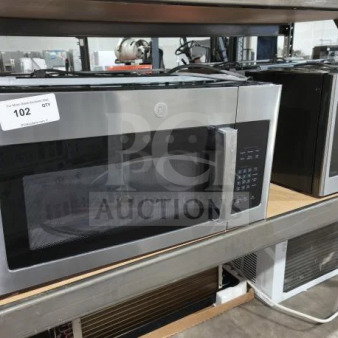 BRAND NEW GE JVM3162RJSS 1.6 cu ft Over-the-Range Microwave Oven, stainless steel. Scratch and dent condition, model label visible.