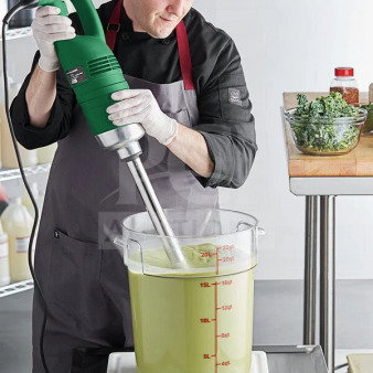 AvaMix 928IBHD18 immersion blender, 18" shaft, brand new condition, green casing, heavy-duty, shown blending liquid in kitchen.