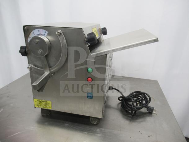 Somerset CDR-100P stainless steel dough sheeter, 10" roller, 115V, excellent condition, tested and working, visible warning label.