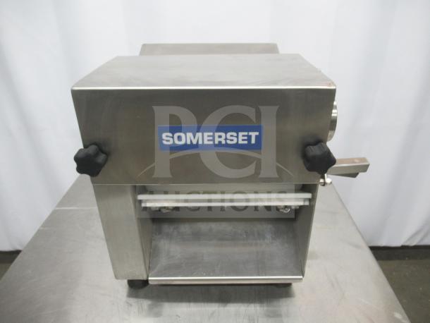 Somerset CDR-100P stainless steel dough sheeter, 10" roller, excellent condition, tested working, visible brand label.