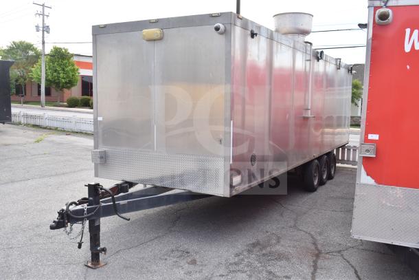 2021 Texino 28ft triple-axle food trailer, equipped with CaptiveAire hood, Ultrafryer 4-bay fryer, True refrigeration suite.