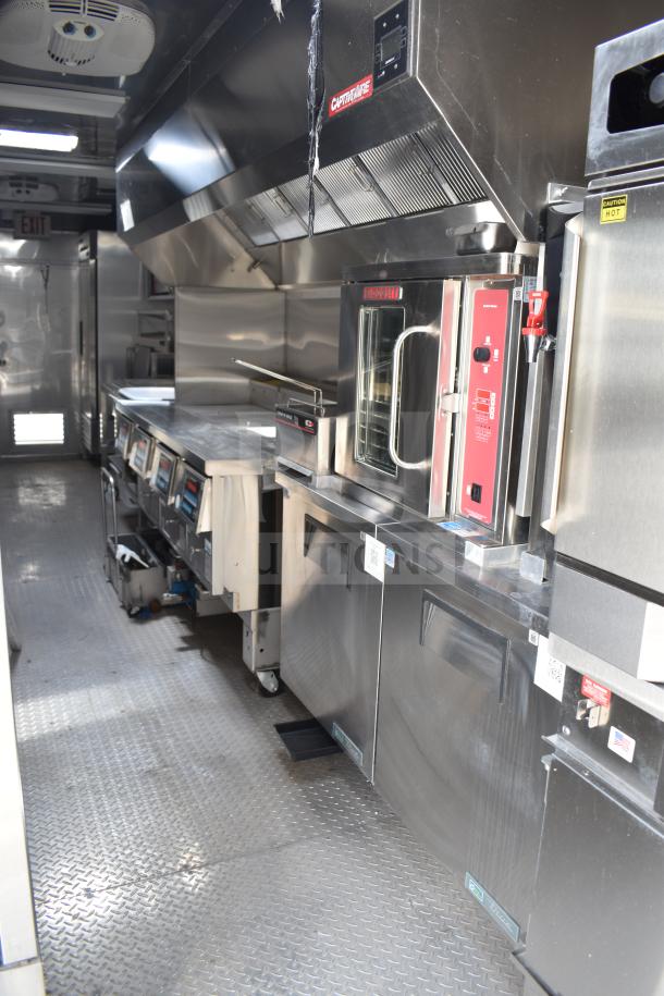 2021 Texino 28ft food trailer with CaptiveAire hood, Ultrafryer 4-bay fryer, True refrigeration, Winston CVap. New condition.