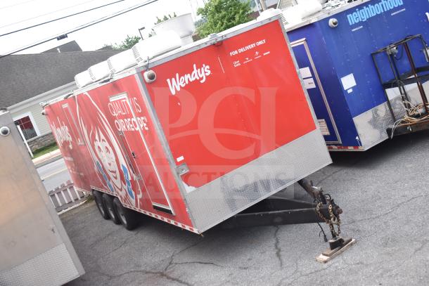 2021 Rock Solid Cargo 28ft triple-axle food trailer with Wendy's branding, featuring Henny Penny fryer, Taylor griddle.