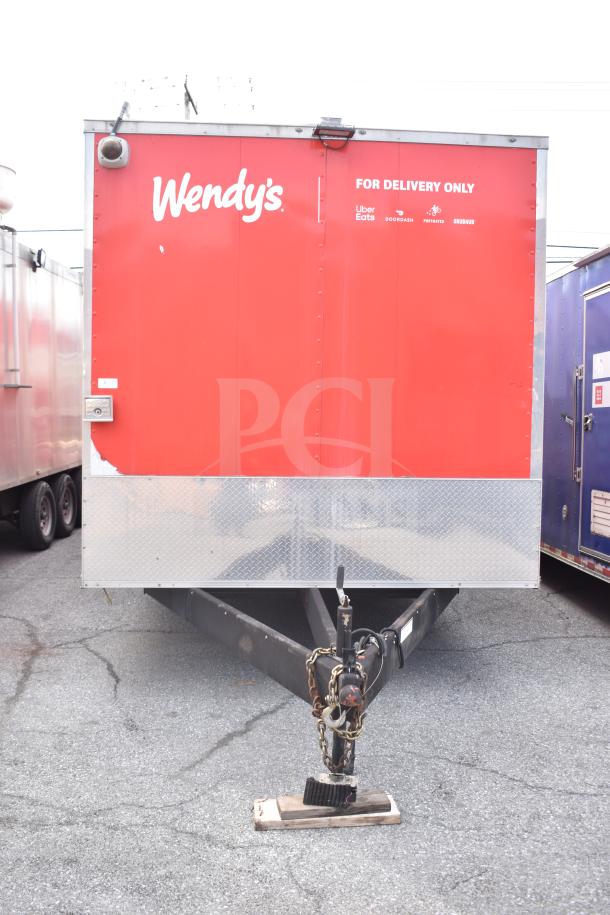 2021 Rock Solid Cargo 28ft food trailer, red exterior, features Henny Penny fryer, Taylor griddle, CaptiveAire hood.